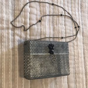 Boxy metal cage purse